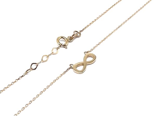 Auksinė grandinėlė su begalybės ženklo pakabuku